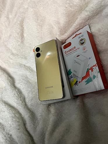samsung qimeti: Samsung Galaxy A06, 128 GB, rəng - Qızılı, İki sim kartlı — 4