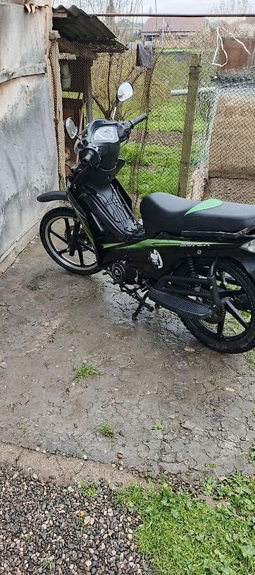 Skuter tipli motosiklet – şəhər içi və qısa məsafələr üçün qənaətcil