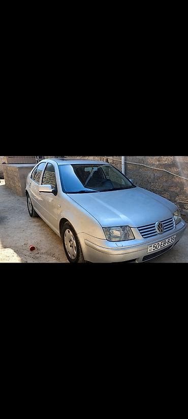 Volkswagen Bora (sedan), gümüşü rəng. - Salon: qara parça oturacaqlar — 2