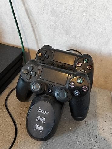 plata 1155: PlayStation 4 Pro 1 TB +2 ədəd oyun konsolu Təmiz Saxlanılıb 6 ay — 2