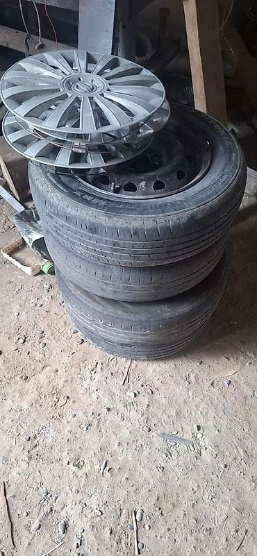 14 disk teker: Məhsul: 4 ədəd təkər diski və şin komplekti + 4 ədəd kalpak - Ölçü — 2