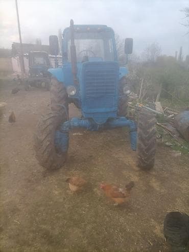 nolyeddi sekilleri yukle: Mavi rəngli təkərli traktor - 4x2 konfiqurasiyalı, geniş arxa — 4