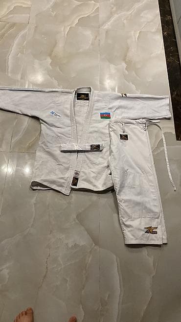 sport dest: Məhsul: Cüdo kimono dəsti (geyi̇m + şalvar + kəmər) Xüsusiyyətlər: - — 1