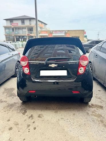 sur ron: Chevrolet Spark LS, qara rəngli, şəhər üçün kompakt hetçbek. Texniki — 2