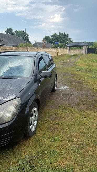kia optima 2 sade mator: Opel Astra: 1.3 l | 2006 il Universal — 1