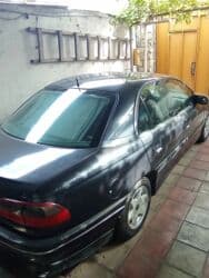 maşın üçün ətir: Opel sedan - Kuzov: 4 qapılı sedan, tünd rəng - Nömrə: AZ 90-DB-997 — 4