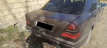 mersedes rolu: Mercedes-Benz C-Class: 2.5 l | 1994 il Sedan — 3