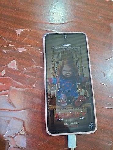 telefon ucun qablar: Məhsul: Smartfon (Android) - Ekran: Tam ekran, mərkəzdə ön kamera — 1