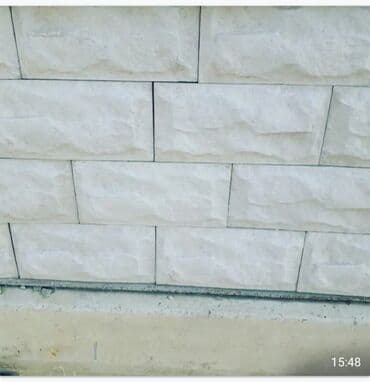 fasad kafelləri: Fasad üçün müxtəlif rəng və fakturalı dekorativ daş panelləri. Bu — 27