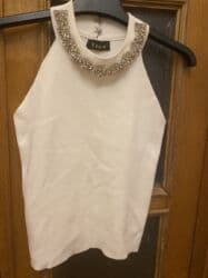 qadın geyimləri və qiymətləri: Qadın geyimləri – 2 fərqli model 1) Ağ bluz: - Yumşaq, axıcı parça - — 28