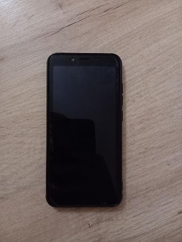 islenmis notebook satisi: Xiaomi 64 GB, rəng - Qara, 
 Barmaq izi — 3