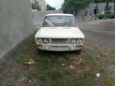 ваза напольная стеклянная высокая без узора: Model: VAZ 2106 sedan Xüsusiyyətlər: - Rəng: ağ, 4 qapı - Mexaniki — 15