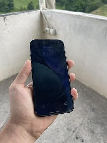 apple 5 s: IPhone 15, 128 GB, Qara, Face ID — 2