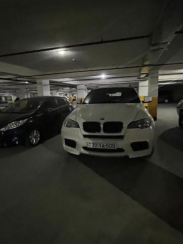 ağ 07 sekilleri: BMW X6, ağ rəng, 4 qapılı kupe-SUV gövdə. Güclü və dinamik görünüşlü — 3