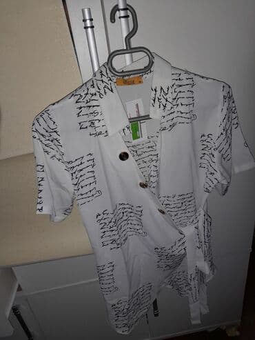 ağ koftalar: Kofta xanımlar üçün olan bu gözəl qısaqol kofta satılır. 38 razmerdir — 3