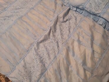 Prosvali mavi rengde pokrival ve 2 balis uzu olqn dest, teze kimidir — 3