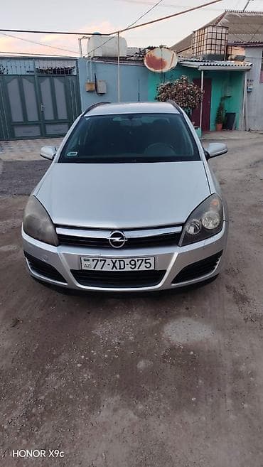 Su nəqliyyatı: Opel Astra: 1.3 l | 2006 il 255000 km Universal — 1