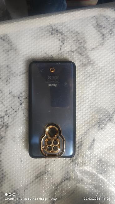 telfonlar: Redmi smartfon + 2 ədəd qab - Model: Redmi (arxa tərəfdə “Redmi” — 4