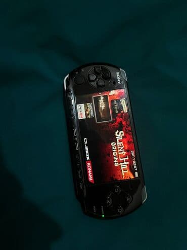oyun kaseti: Psp 3004 8 gb memory quraşdırılıb sarj cihazı yoxdu Real alıcıya — 1
