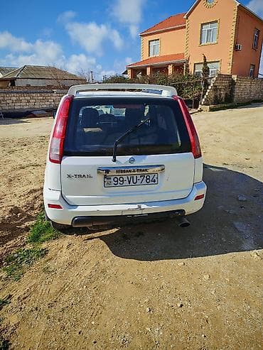 аккумулятор 12в 7а ч: Nissan X-Trail, ağ rəng, 5 yerlik krossover/SUV. Texniki və komfort — 7