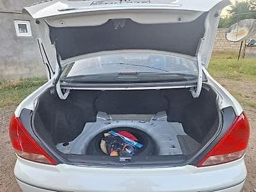 Nissan Bluebird: 1.6 l | 2007 il Sedan — 9