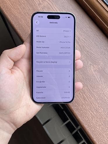 apple iphone 1: IPhone 14 Pro, 256 GB, Deep Purple, Face ID — 10