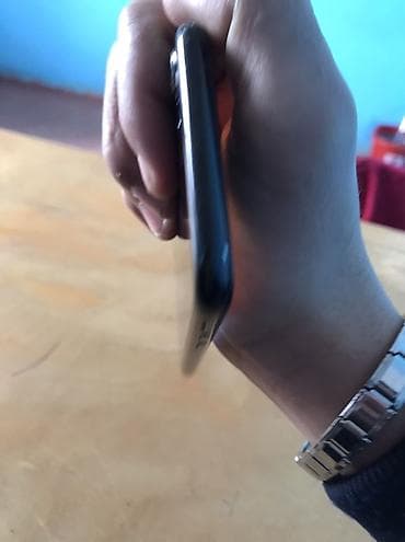 iphone 15 pro max islenmis: IPhone 7, 128 GB, Qara, Barmaq izi — 5