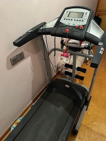 Elektrikli qaçış trenajoru – çoxfunksiyalı ev fitnes aparatı 1000