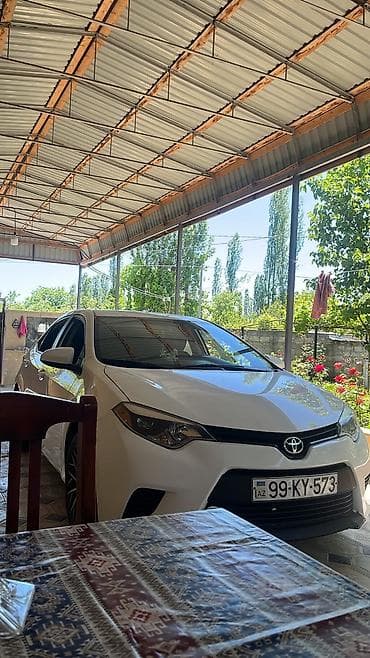 Toyota Corolla, ağ rəng,sedan gövdə. I - Nömrə nişanı: 99-KY-573 — 8