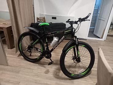 velosiped kameri: Panther markalı bu dağ velosipedi qara rəngdədir və yaşıl detallarla — 1