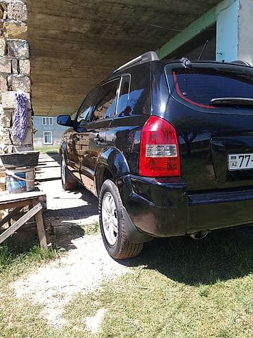 opel astra k: Hyundai Tucson: 2.7 l | 2006 il Ofrouder/SUV — 1