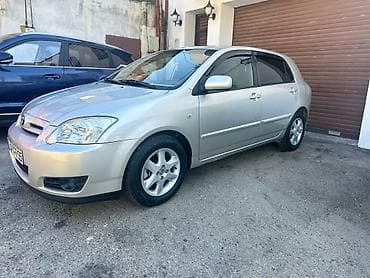 corolla cros: Toyota Corolla (E120) hatchback – gümüşü rəng Texniki və dizayn — 5