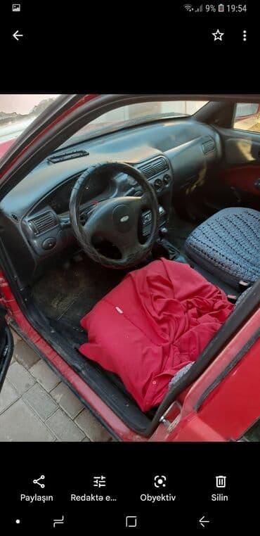 07 sekilleri profil üçün: Ford Escort: 1.6 l | 1998 il 100000 km Hetçbek — 6
