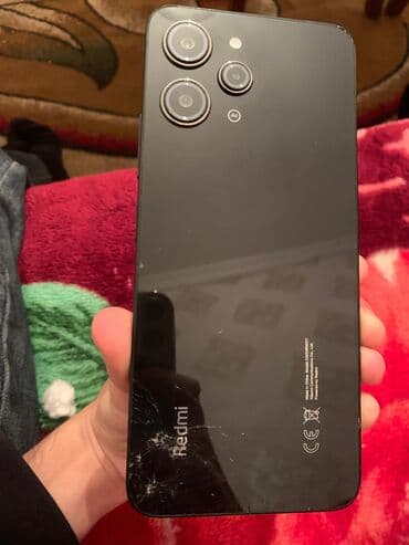 аккумулятор 12: Redmi 12, 256 ГБ, цвет - Черный, Отпечаток пальца — 2