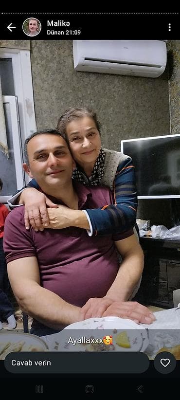 Qadın qış komplekti - Çəkmə: Qara rəngdə, orta baldır hündürlüyündə