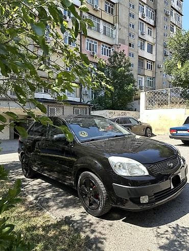 diskilər: Kia Rio: 1.4 l | 2008 il Sedan — 3
