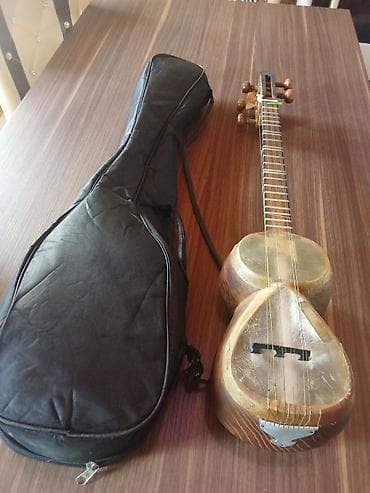tar instrument: Tar – klassik Azərbaycan musiqi aləti, yumru gövdəli, dəri ilə örtülü — 1