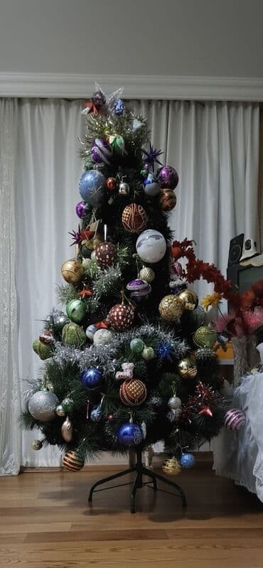 agac satilir: Yeni il yolkasi. Uzeri qarli hundurluyu 1.50 m olan yolka. 200 manata — 2