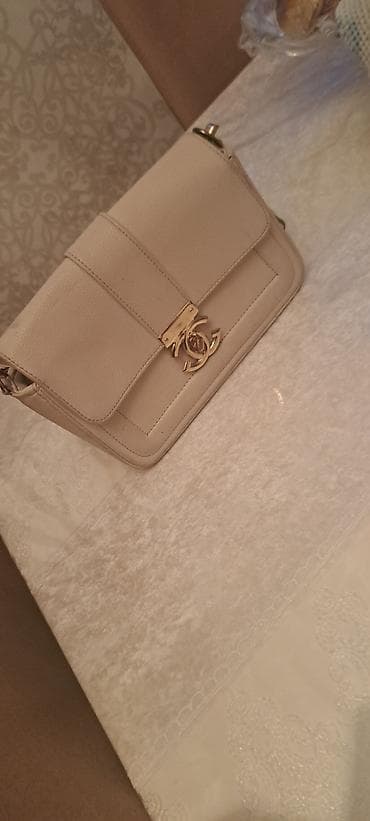 Əl çantası, İşlənmiş