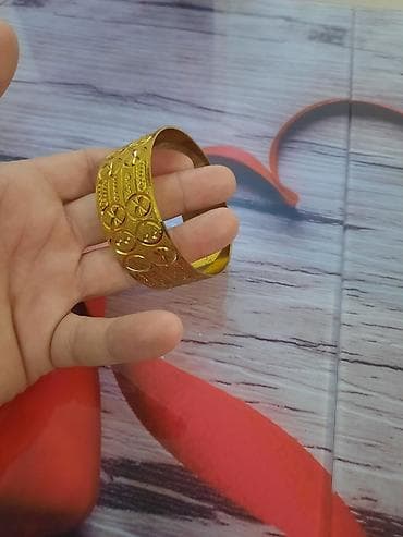 Ювелирные изделия: Qızılı rəngli geniş bujiteriya qolbaq - Material: metal ərintisi — 1