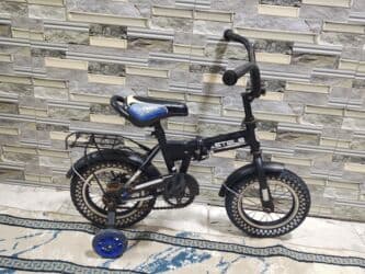 Oyuncaqlar: İşlənmiş İki təkərli Uşaq velosipedi Stels, 12", Ünvandan götürmə — 2