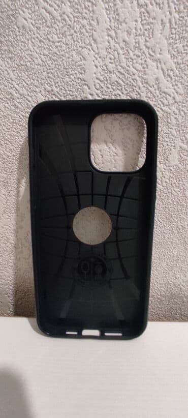 Kompüter, noutbuk və planşetlər: Qara rəngdə, Spigen markasına məxsus telefon qılıfı. İçərisi hörümçək — 1