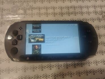psp сколько стоит: PSP əl oyun konsolu. Cihazın ekranında "Call of Duty" və "Need for — 1