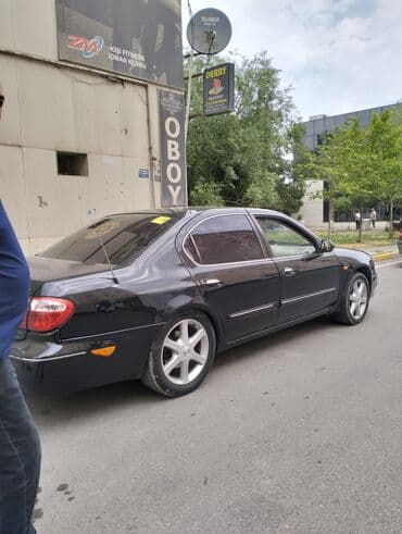 afdamabiler: Nissan Maxima: 2 l | 2006 il Sedan — 10