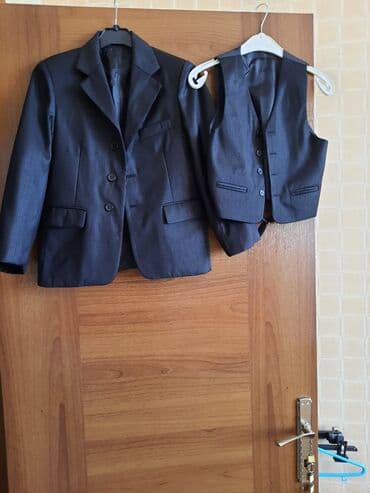 Məktəbli forması: Kostyum + jilet desti oglan ucun. Gence seheri — 1