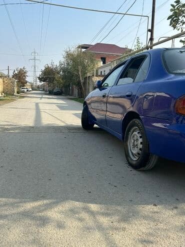 kia sou 2013: Hyundai Accent: 1.5 l | 1995 il Sedan — 5