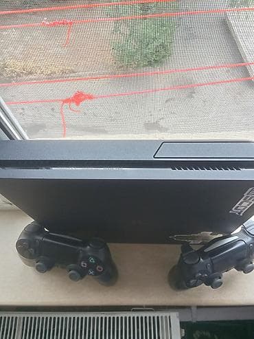 ps 4 orjinal: PlayStation 4 Slim oyun konsolu + 2 ədəd DualShock 4 idarəetmə pultu — 4