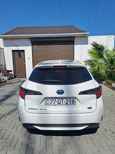 şüşə satışı: Toyota Corolla Touring Sports Hybrid – universal kuzovlu, ağ rəng — 3