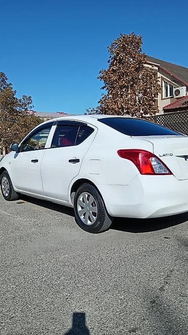 Аксессуары и тюнинг: Nissan Sunny: 1.2 л | 2013 г. Седан — 3