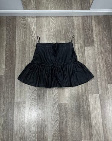 xadimə geyimləri: Deri etek — 1